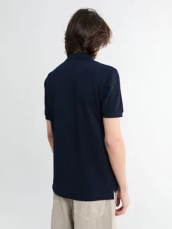 Polo med rødt emblem i navy