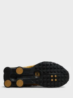 Shox R4 Sneakers i Sort og Metallic Gold